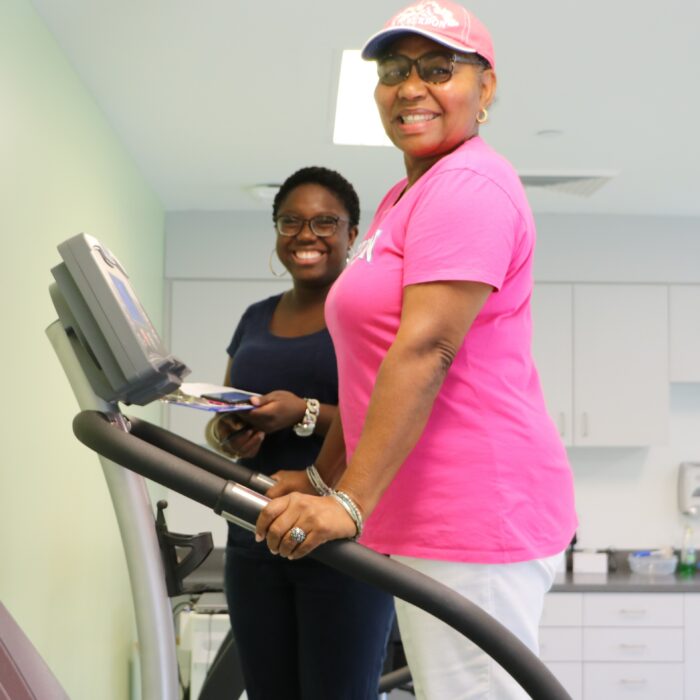 AU/UGA Medical Partnership student Adolphia Lauture (left) oversees a study visit